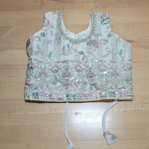 Embroidered Sleeveless Top with Floral Design